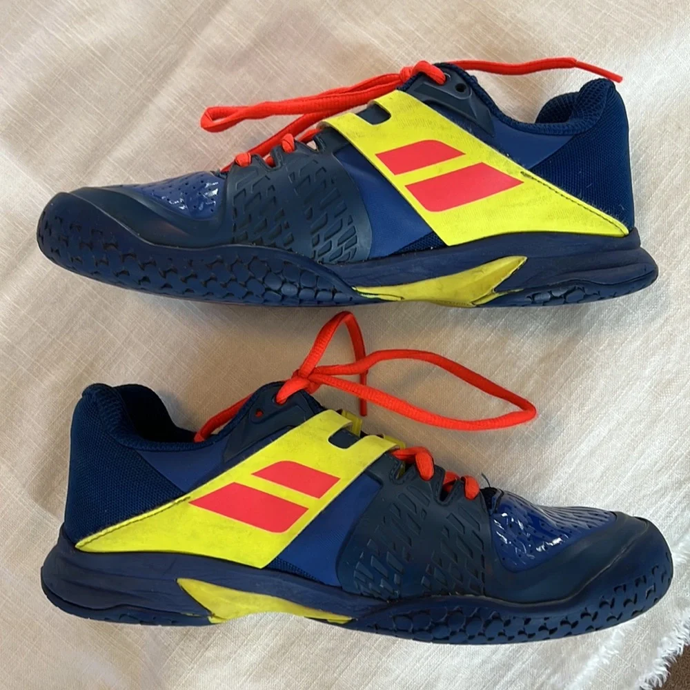 Babolat boy tennis shoes.  Size 5